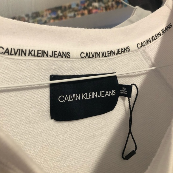 Calvin Klein white logo crop top. size large, relaxed look and feel. NEVER WORN - Picture 3 of 4